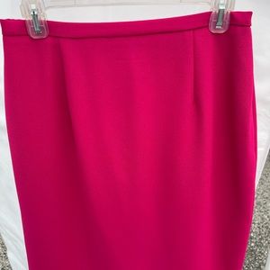 Pink woman's business suit